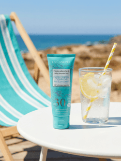 Fluide solaire lacté SPF 50+ bio - corps et visage – Image 5
